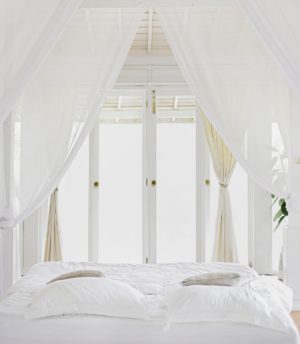 white hangings bed